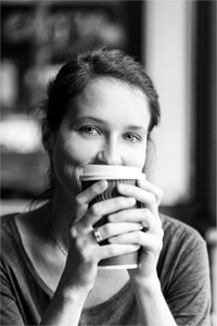 toomers_coffee_roasters_woman_enjoying_microlot_coffee